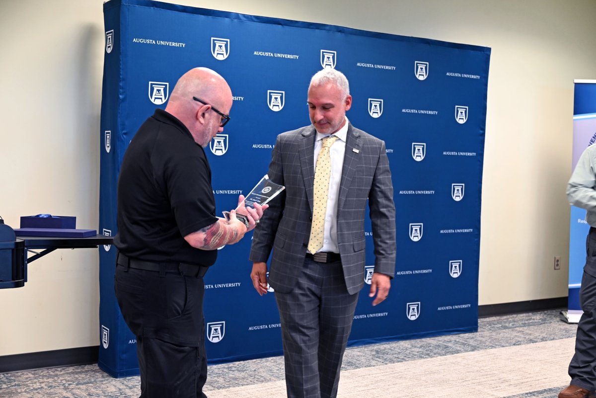 FBIAtlanta's tweet photo. FBI Atlanta is proud to present the FBI Director's Community Leadership Award to Augusta University's John Ryan.   The Award recognizes individual leadership and reflects the collaborative spirit that defines a program John has worked hard to build--#StrongAugusta. Ryan is a coordinator for the University's Office of Critical Event Preparedness & Response.  @Aug_University