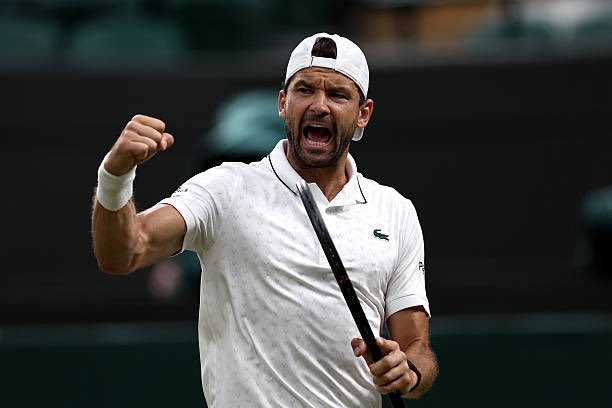 TheTennisLetter's tweet photo. Dimitrov d. Jakub Mensik 7-6 4-6 7-5 6-3

Grigor is re-writing his story this year at Wimbledon.

Last year, he suffered more on a tennis court than anyone should ever have to.

Because of that injury, he had to get in as a wildcard. 

Currently the world #146.

But he just beat the Roland Garros semifinalist.

✅8th Wimbledon R3
✅1st Slam R3 of 2026

Refusing to let heartbreak be his defining moment at Wimbledon. 

🇧🇬🥹