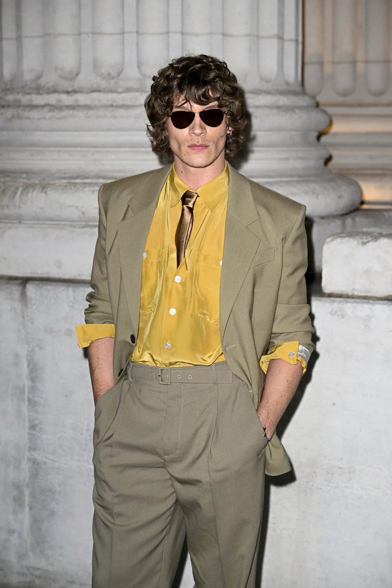 updatingstorrie's tweet photo. Connor Storrie and his iconic yellow YSL look are mentioned in Teen Vogue!

“Guys are all in on yellow as well, with Heated Rivalry star Connor Storie looking chic in a '70s-inspired yellow shirt and beige suit at Saint Laurent.”

🔗 https://t.co/5os7pIpcFE https://t.co/WdugrV8pJD