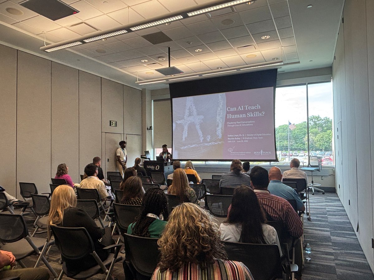 BuffettECI's tweet photo. The Buffett Institute's Dalhia Lloyd and Maurice Bailey from @BoysTown demoed the Reality Coach AI teaching tool at this week's #OMAxAI conference at @UNOmaha. 
 
Learn more about this exciting partnership: https://t.co/Rn0YMdznRQ https://t.co/Q2tL7ZjFZ2