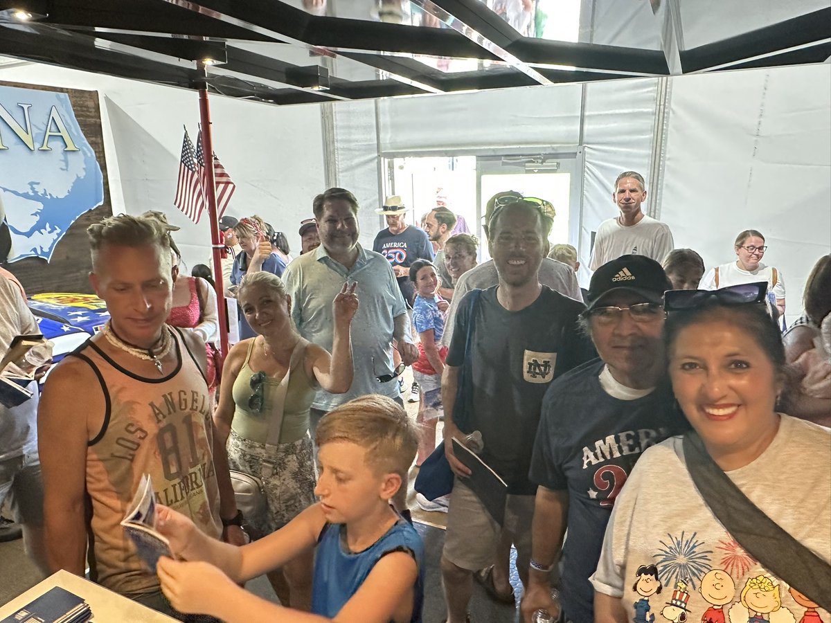 Brett_Jensen's tweet photo. There’s a narrative ppl aren’t going to the National Mall in DC to for the Great American State Fair. Natasha Rodriguez is COO of Operation Helo & one of many volunteers helping run the NC tent. She says they’re averaging 75 visitors every 10 minutes (450 per hr) & and it’s getting busier each day. She also says because everyone is in one of the 56 booths that it may not look busy but in reality it’s nonstop.