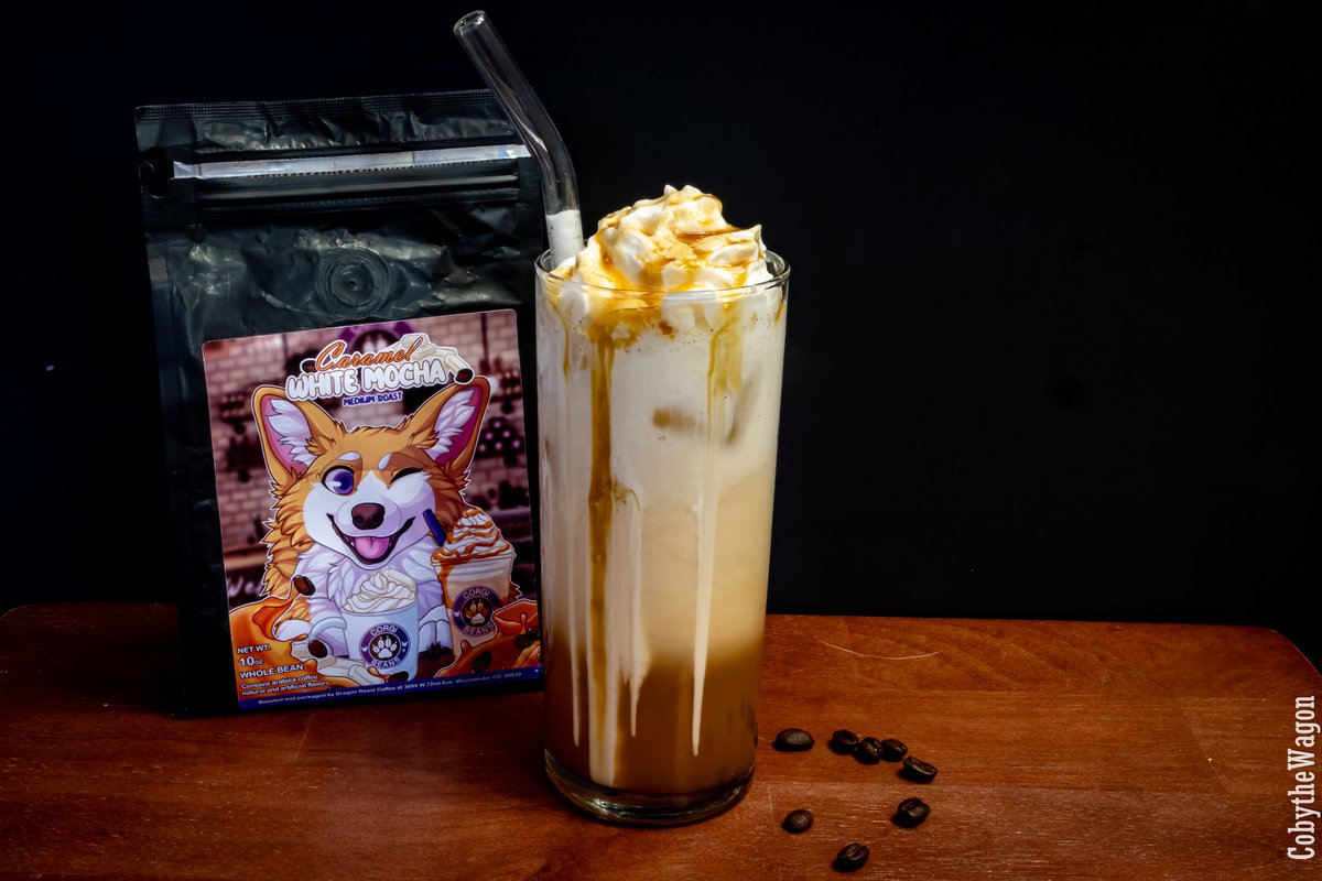 CobyWagon's tweet photo. Corgi Cafe Part 6: Pawprint Cream Soda

Creamy vanilla, caramel white mocha coffee syrup, sparkling soda, and a cloud of whipped cream finished with caramel drizzle.

Made with the @DragonRoast × @BuildAFur  Caramel White Mocha Roast.

#furry #coffee #drinkphotography https://t.co/OFosFFAhWd