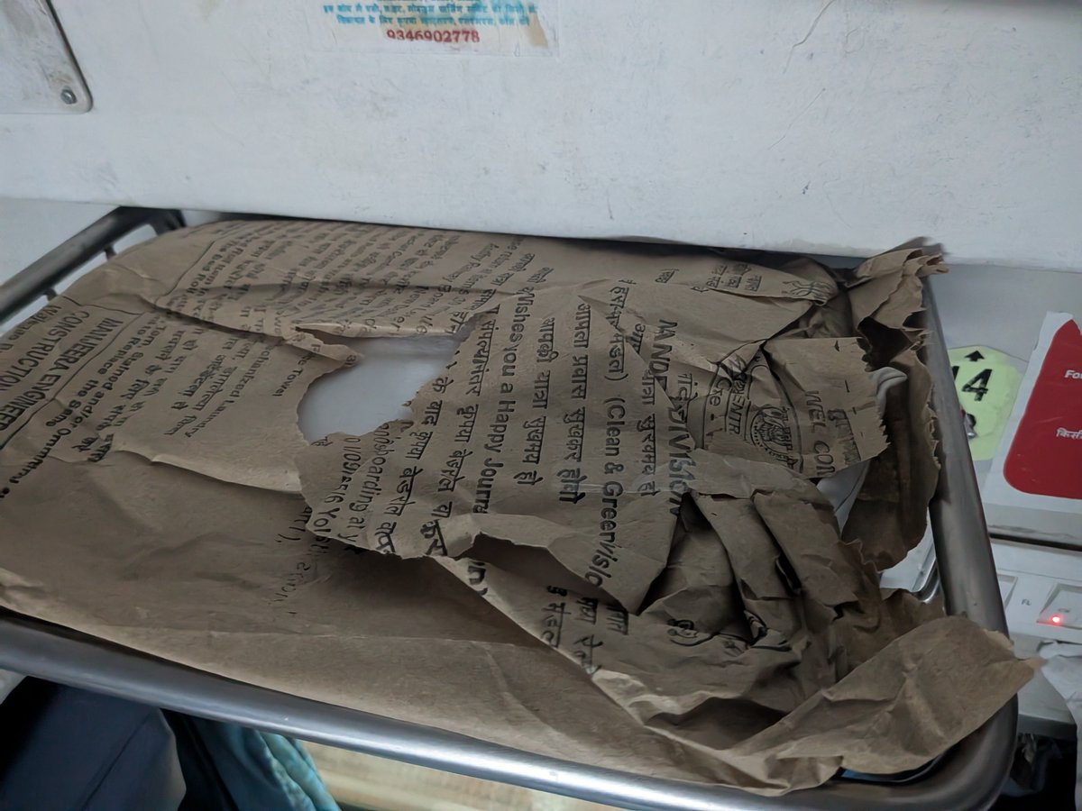 V1dyam's tweet photo. @RailMinIndia @IRCTCofficial 
Train number 17629.
Hadapsar to Nanded. 
All the bed linen and sheets provided in the 2nd AC coach are used, just folded. Not even washed. 
The packets are reused and tampered.
This is not what fresh sheets look like. https://t.co/9g8IXIMICH