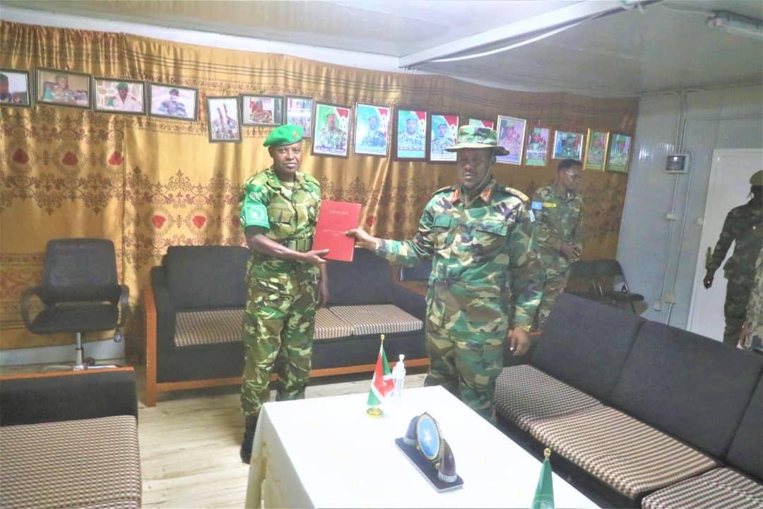 aussom_'s tweet photo. Today, AUSSOM Sector 5 Commander, Brig. Gen. Michel Ndenzako, received the Somali National Armed Forces 3rd Brigade Commander in Middle Shabelle, Brig. Gen. Saney Abdulle, during a courtesy visit to the Sector HQs at Jowhar Airfield.

Brig. Gen. Ndenzako briefed the delegation on the security situation and commended @SNAForce for its strong partnership and joint operations with #AUSSOM against Al-Shabaab. Brig. Gen. Abdulle thanked the Burundian contingent for its professionalism, dedication, and sacrifices, acknowledging #AUSSOM's contribution to strengthening the @SNAForce's operational capacity.

The two commanders pledged to strengthen cooperation through intelligence sharing, coordinated patrols, and joint operations to enhance security and protect civilians. Both leaders reaffirmed their commitment to lasting #peace, #security, and stability in Middle Shabelle and across #Somalia. #AUSSOMInTheSectors