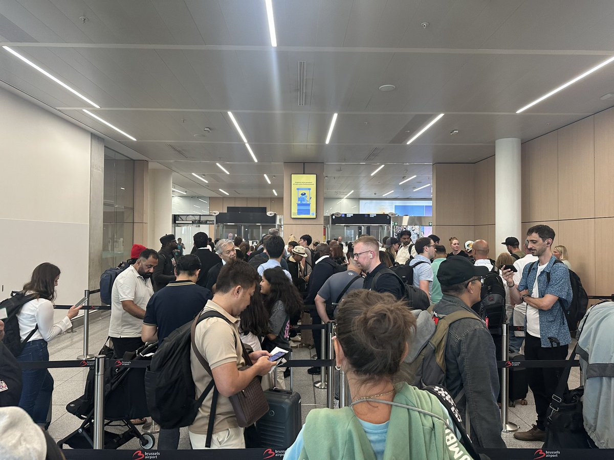 FredHayrapet's tweet photo. Passport control line for LEAVING Brussels. This is the heart of the EU, The people lecturing the whole world. They can’t run a basic service. Von der Leyen and her band of morons. https://t.co/tHAoPlbV3w