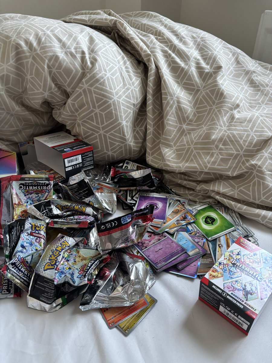 BethDaviess1's tweet photo. The mess vs the ✨ reward ✨ 
Nice hit today out of my prismatic booster! @dropalertsuk @pokemondealsuk https://t.co/pPaDG6A3LT