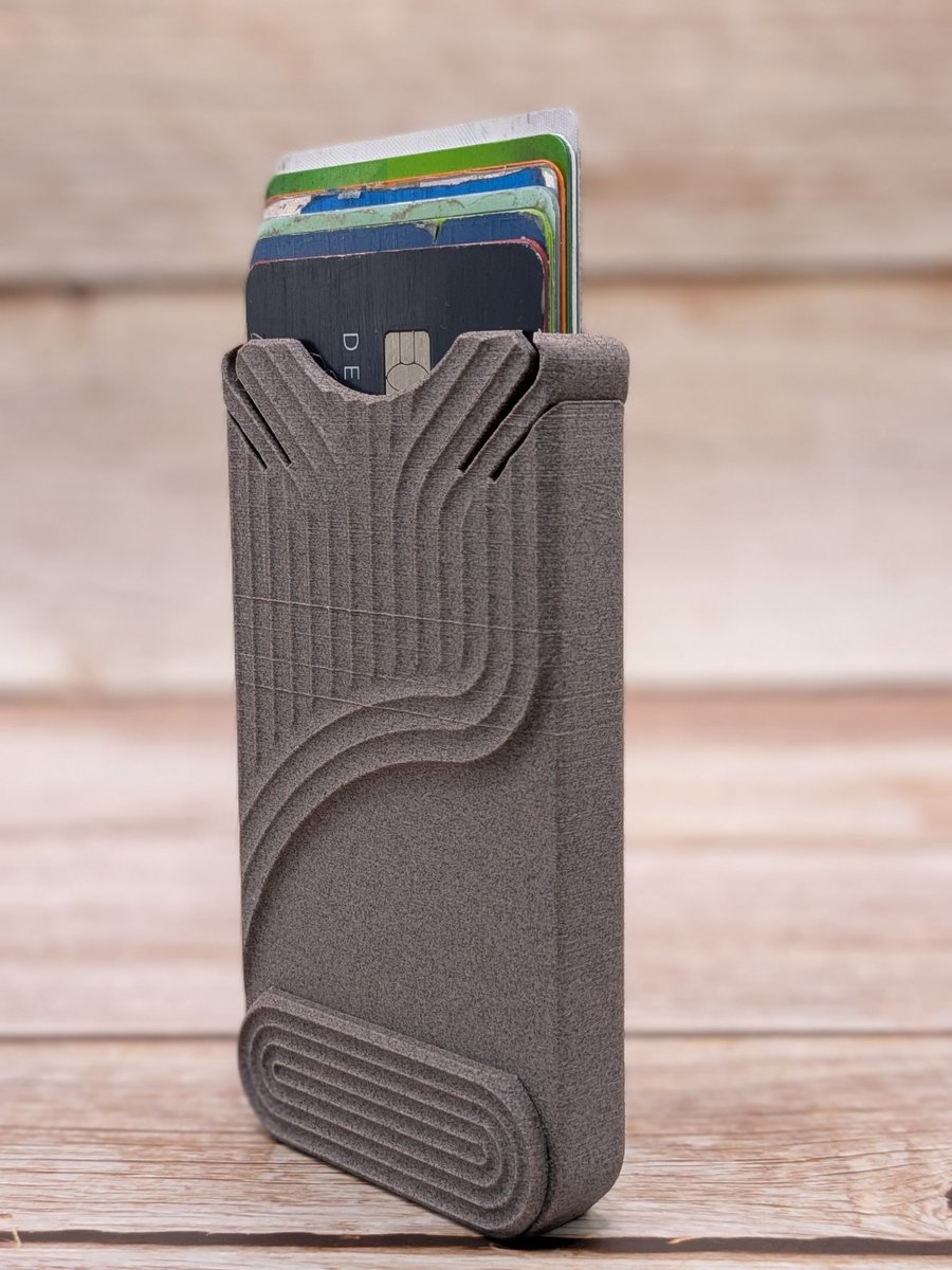 TechJeeper's tweet photo. Cascade Wallet v3 from MakerWorld in KiwiFil WoolFil filement!  https://t.co/w3j6gLVW1t https://t.co/IqilFJfEDo