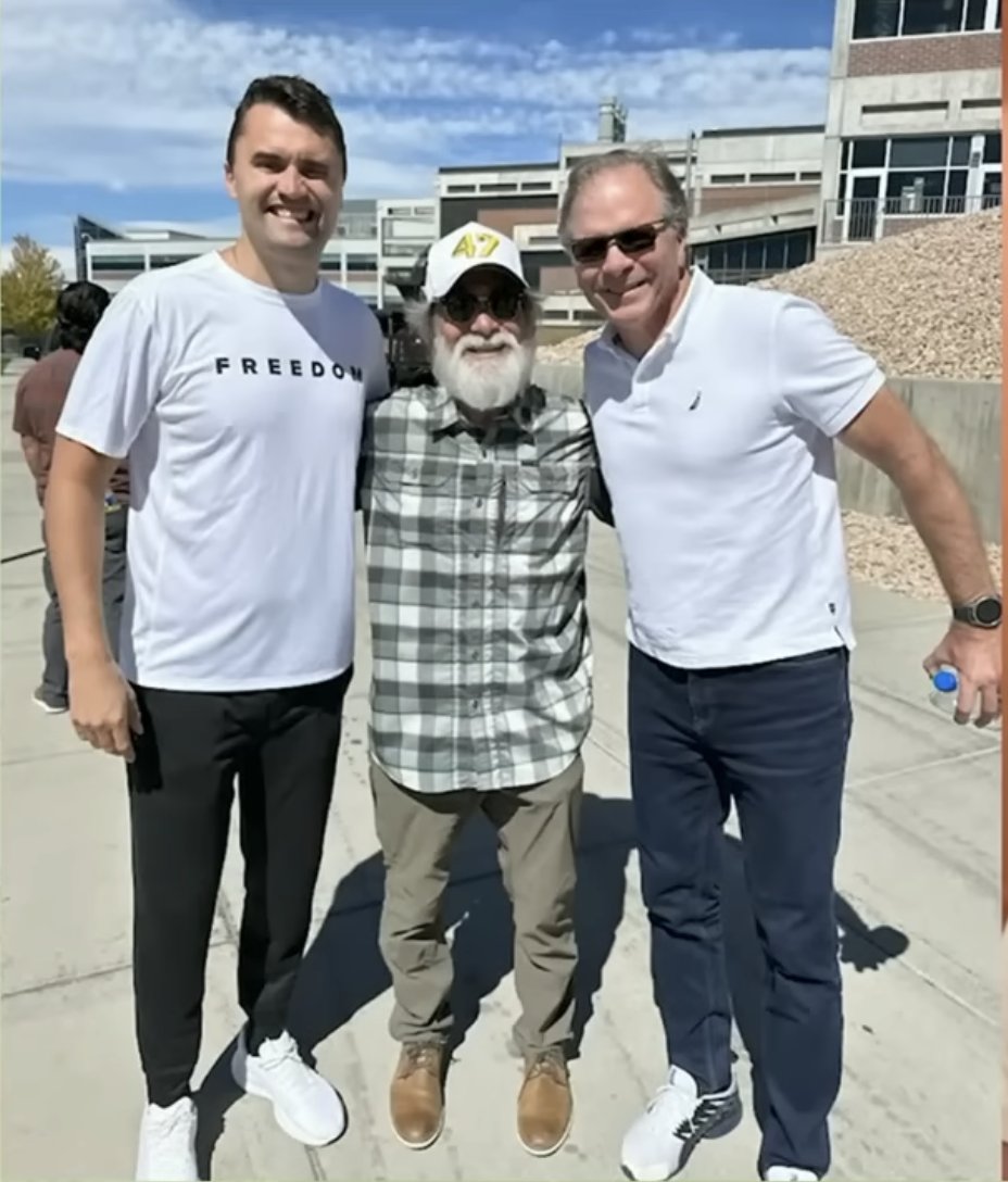 AmericaOnlyBro's tweet photo. Did you know the day that Charlie Kirk was killed he took these photos with Butch Hibbs after landing at UVU? Look at the object in his front pocket perfectly mirroring the RODE microphone's dimensions.

As the event was beginning, Butch was photographed next to the person who put the microphone on Charlie and lingering around the crime scene after the killing.

 I got this directly from https://t.co/ivfxCGRbWv created by @whokilledck .