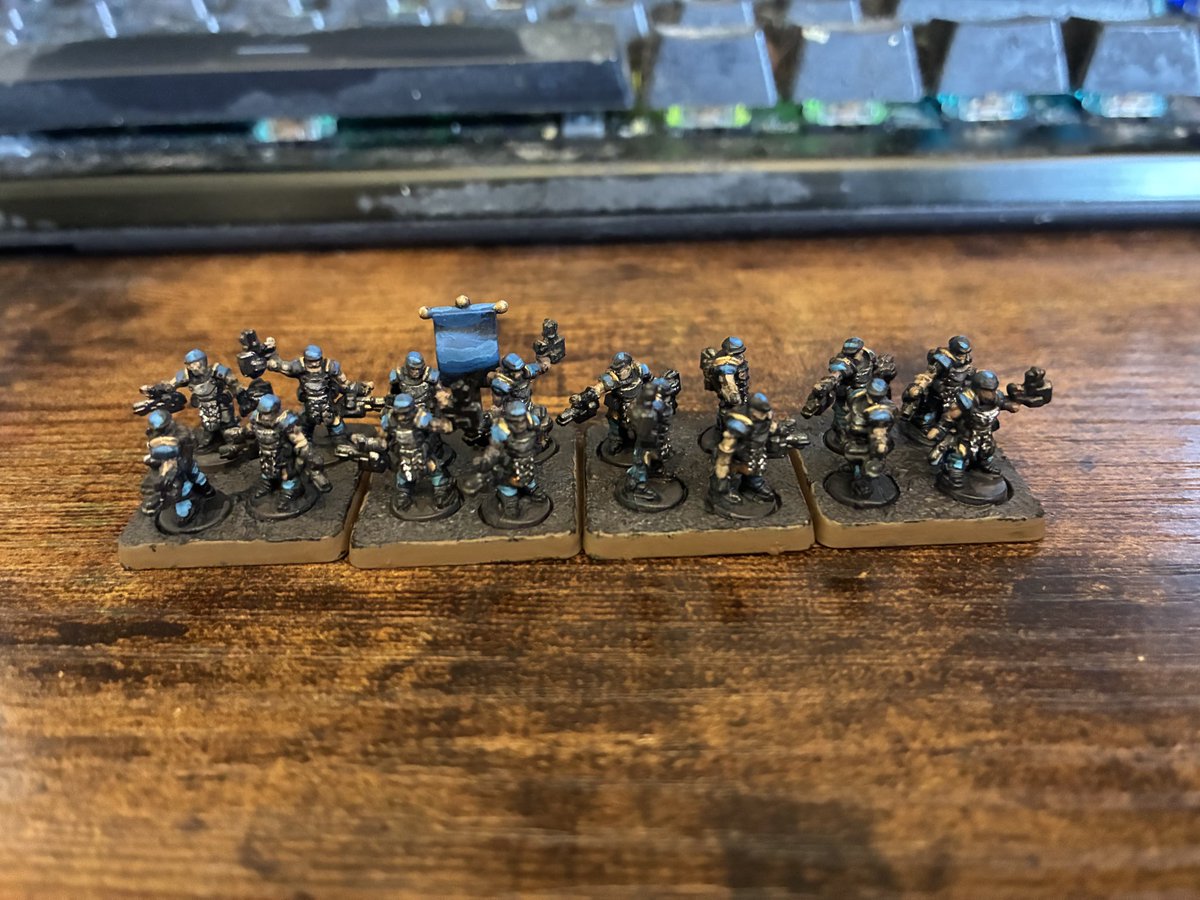 table_top_dad's tweet photo. In today’s episode of “I Really Don’t Want To Paint All The Gold Trim On My Crown Ships”, we have a 95% complete Union Pacifier Squad for #armouredclash. I’m still working on the best ways to photograph such tiny minis, so bear with me. 

#minipainting #tabletopwargaming https://t.co/oivba9PBFG