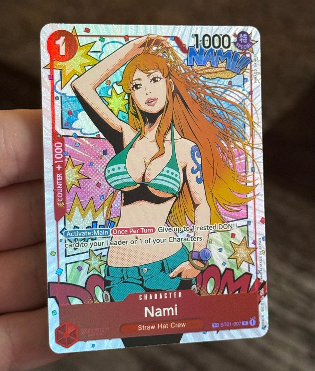 BandzMcBagz's tweet photo. this is the best Nami one piece card. https://t.co/ICPm3GGEZY
