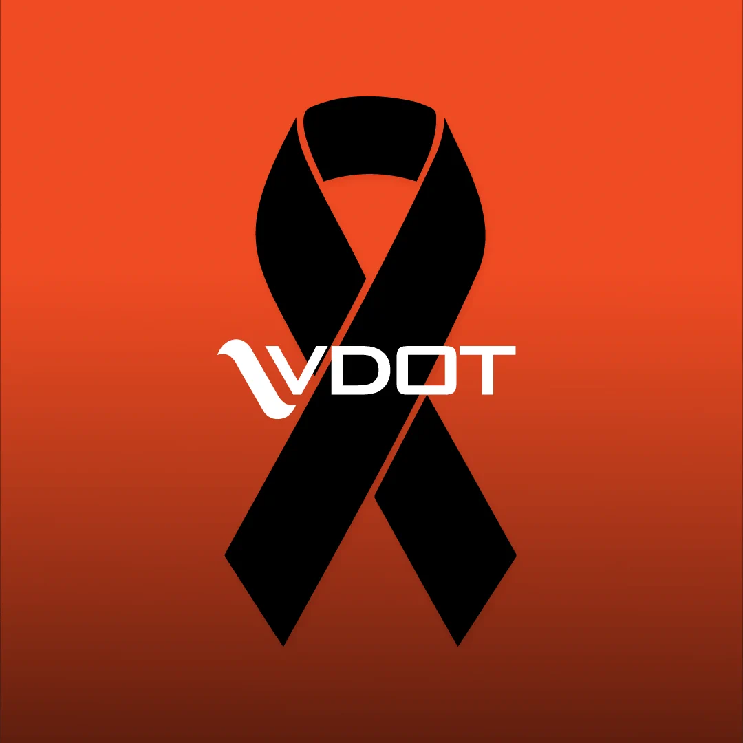 A black ribbon with the VDOT logo on an orange background.