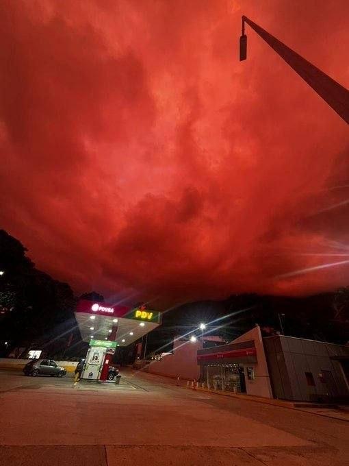 MOSSADil's tweet photo. 🇻🇪 VENEZUELA EARTHQUAKE DEATH TOLL CLIMBS TO 2,295

Venezuela’s June 30 earthquake has now claimed 2,295 lives, with 11,267 people injured as rescue and recovery operations continue. Authorities say the striking red skies seen near Caracas days after the quake were caused by Rayleigh scattering, as fine dust particles filtered sunlight to emphasize red and orange wavelengths.