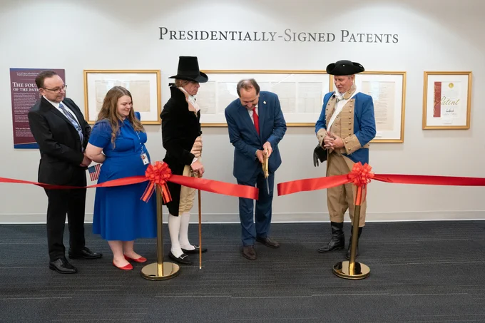 Photo of the Presidentially Signed Patents exhibit ribbon cutting ceremony.