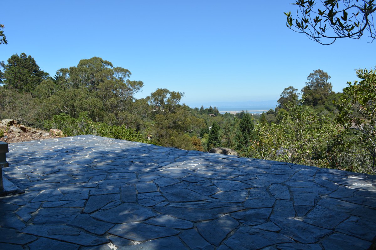 zillowgonewild's tweet photo. Per the listing the main house on this property burned down 17 months ago, but the guest house and 3 car garage is still there. also it has a “small outcropping mountain” on it that the “prior owner craeted a cave system that runs thru it ending at the top of the mountain with views of the SF bay”. Also the property is attributed to the inventor of the slot machine. Currently listed for only $3,450,000. also in the listing there are renderings for what you can do with it and he guest house and garage are currently rented for $5k a month