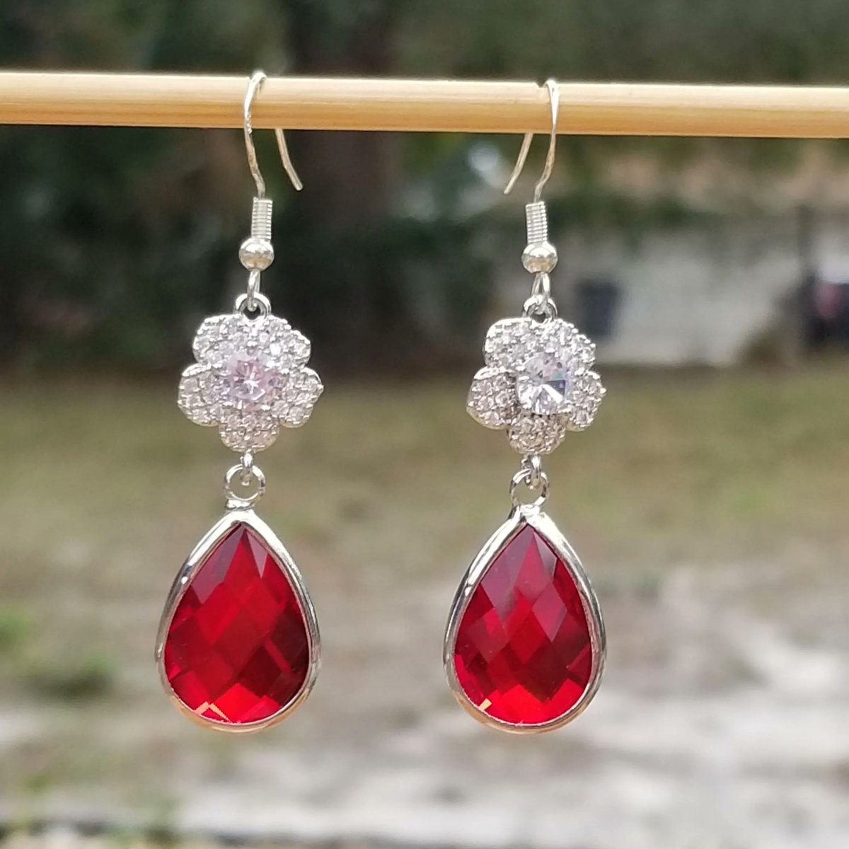 TrendingNowGift's tweet photo. Sterling Silver Ruby Teardrop Floral Dangle Earrings #JulyBirthstone #ruby #rubyearrings #rubyjewelry #Julybirthday #handmadejewelry #handmadeearrings #dangleearrings #silverearrings #handmadegift #giftforher #etsy #birthstonejewelry 

 https://t.co/UDZG7v7z9w via @Etsy https://t.co/HkrsGPTNMa