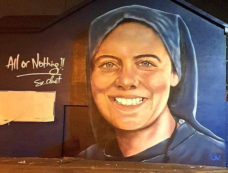CatholicArena's tweet photo. Mural of Sister Clare Crockett in her hometown of Derry https://t.co/8ZMxCsiy4e