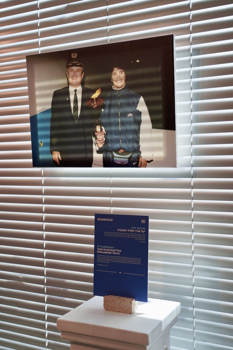 ELALUSA's tweet photo. Connecting Jewish communities around the world with Israel for generations.

Ahead of the 25th Maccabiah, a special exhibition is on display at the King David Lounge, showcasing the long-standing connection between EL AL and the Maccabiah.

Through historic moments, stories of athletes, delegations arriving in Israel from around the world, and one torch that has journeyed across countries, communities, and generations, the exhibition tells a story of identity, pride, and belonging.

At the entrance to the lounge stands the Maccabiah Torch, a symbol of a journey that continues to connect Jewish communities around the world with Israel, as well as people, communities, and cultures.

We are proud to have been part of this journey for decades - and to continue carrying the flag of Israel, from takeoff to the finish line.