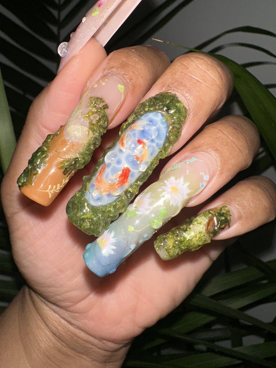 nomfwanime's tweet photo. koi fish and koi ponds! 🥰🫧🩵💚 https://t.co/63MZyRmHzr