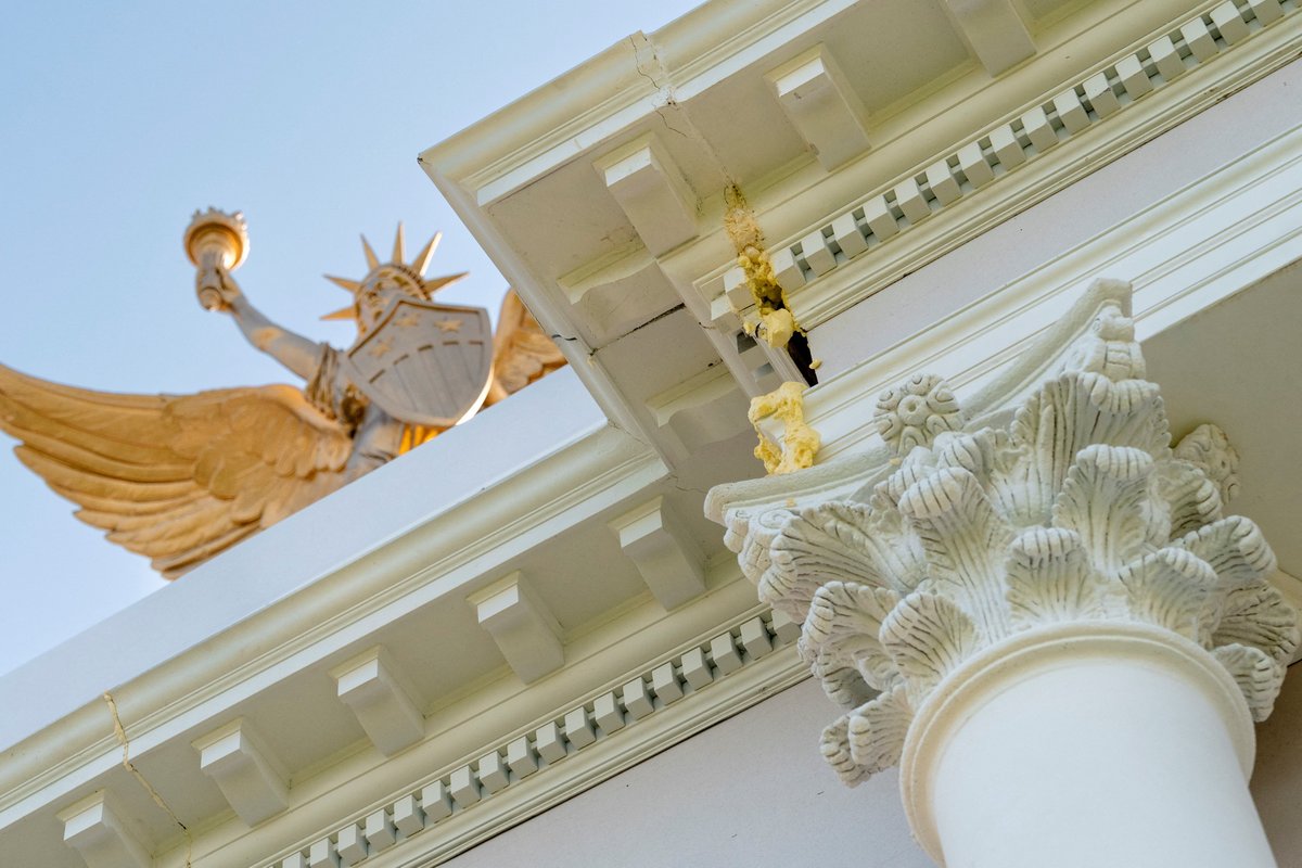 MeidasTouch's tweet photo. Building material oozes from a smaller replica of U.S. President Donald Trump's proposed 250-foot' Triumphal Arch' at the Great American State Fair on the National Mall in Washington, D.C., U.S., July 1, 2026. REUTERS/Cheney Orr https://t.co/GqUDWRAkg0