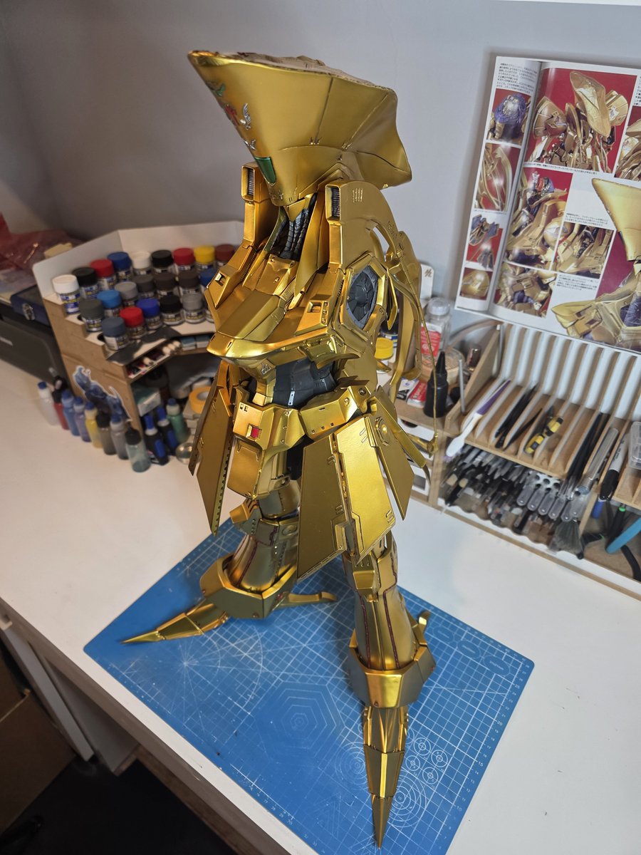 ElecKnightWorks's tweet photo. All the parts that have been painted on the Knight of Gold so far have been assembled! I'm very happy with how this build is turning out so far. I tried to leave the top of the head removable so you could see the Fatima cockpit detail but the way the parts go together that wouldn't work too well. The Headdliner cockpit is still easily visible though. I didn't attach the swords to the hips yet as I want to wait on those until I get the Buster Launcher install on the back so I don't have any fitment issues with them.

Also had a bit of an oopsie when putting the Knight of Gold's chest together and didn't notice till I was going to put the head parts on.  Looks like I pushed too hard and one of the pins pushed through the top a bit. Filed the pin down, fixed any low spots with putty, masked everything up and touched up the paint. I also fixed up the other side since it looked like I didn't sand the resin I used to hold the pin in on that side too well. 

Onto the arms next. Those shoulders are gonna be a slog to paint, but I can't wait to see how they turn out.

#FSS #FSS_jp