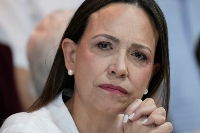MarioNawfal's tweet photo. 🚨🇺🇸🇻🇪 A private jet carrying Venezuela's opposition leader home was turned around midflight, and Washington was behind it...

Maria Corina Machado took off from Virginia last Friday bound for Curaçao, planning to slip back into Venezuela for the first time since her secret December escape, believing the earthquake catastrophe made her return impossible to postpone. 

An hour in, the charter company ordered the pilots to turn the Hawker 800 around over North Carolina. 

Machado was understandably stunned.

She'd believed senior Trump officials had cleared the trip, but the U.S. pulled its support after learning she planned to retrace her risky boat route, and Dutch authorities yanked her landing rights once Washington's opposition became clear.

The rupture runs deeper than one flight.

The White House has thrown its weight behind interim President Delcy Rodríguez, and Machado was bluntly warned through intermediaries that pressing ahead risked losing Trump's support entirely. 

When she tried again through Panama, Copa Airlines refused to board her. 

Rubio is reportedly sympathetic while other officials accuse her of opportunism, a "good cop, bad cop" squeeze on the Nobel laureate who handed Trump her Peace Prize.

The woman whose movement won Venezuela's stolen election is now blocked from her own country's darkest hour, not by Maduro, but by the ally she bet everything on. 

Talk about a plot twist...

Source: Wall Street Journal / Writer: Daniel