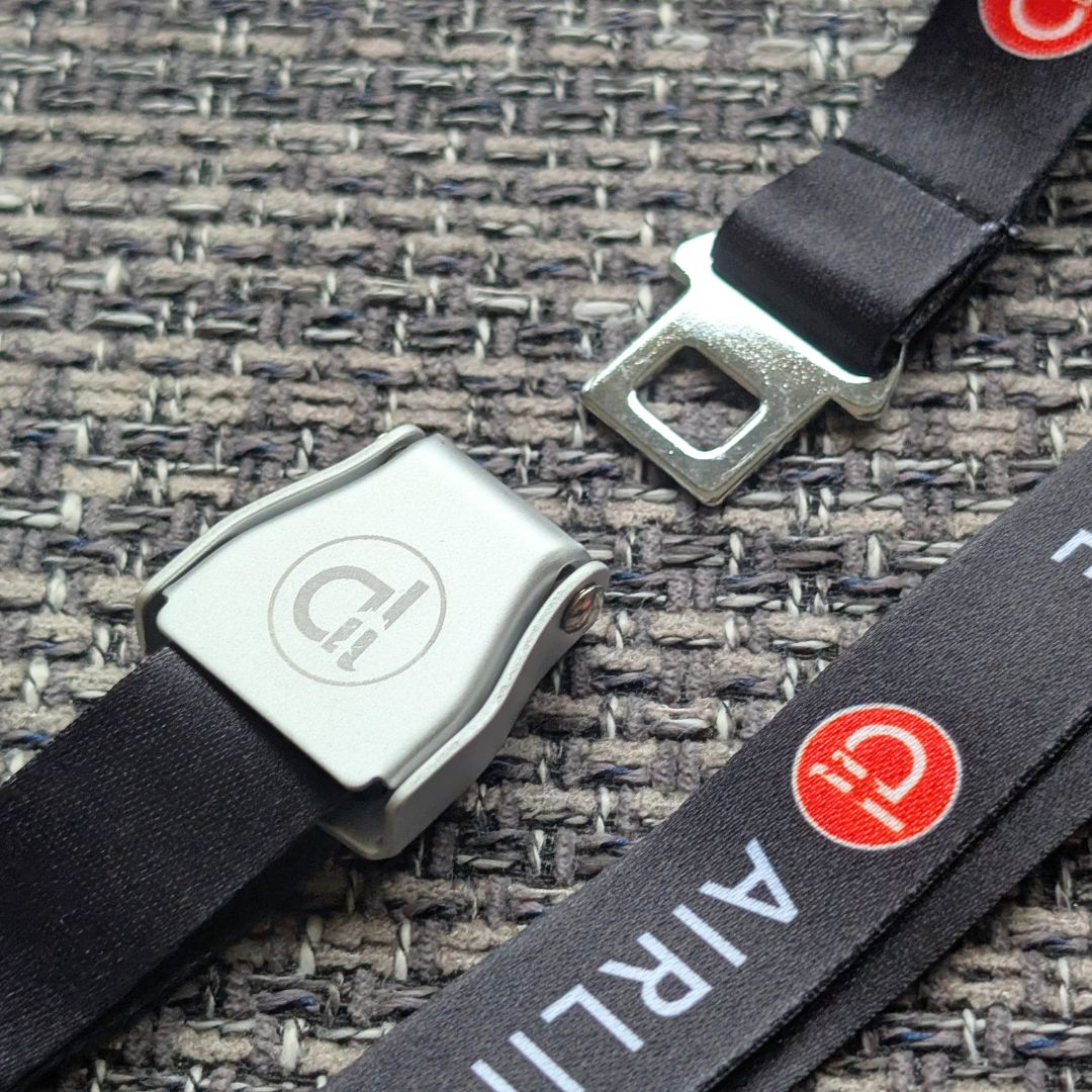 airlinerslive's tweet photo. The seatbelt lanyards are back! ✈️

We stocked these a few years ago, and we thought it was time for a return to the store.

Rep your love for aviation with an authentic airline seatbelt buckle mechanism, laser-engraved with the Airliners Live logo ❤️

We also have Fleetlog ones for those who love to log planes 🩵

Only a limited number available, link in the replies 👇