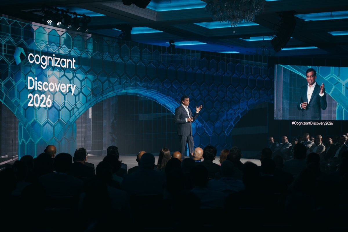 Cognizant's tweet photo. AI models are getting smarter. But intelligence alone is not enough. At #CognizantDiscovery2026, @imravikumars, CEO of Cognizant, explored how Cognizant is building the bridge from AI capability to enterprise impact by operationalizing agentic AI at scale – not only to optimize current operations, but to create entirely new value streams.