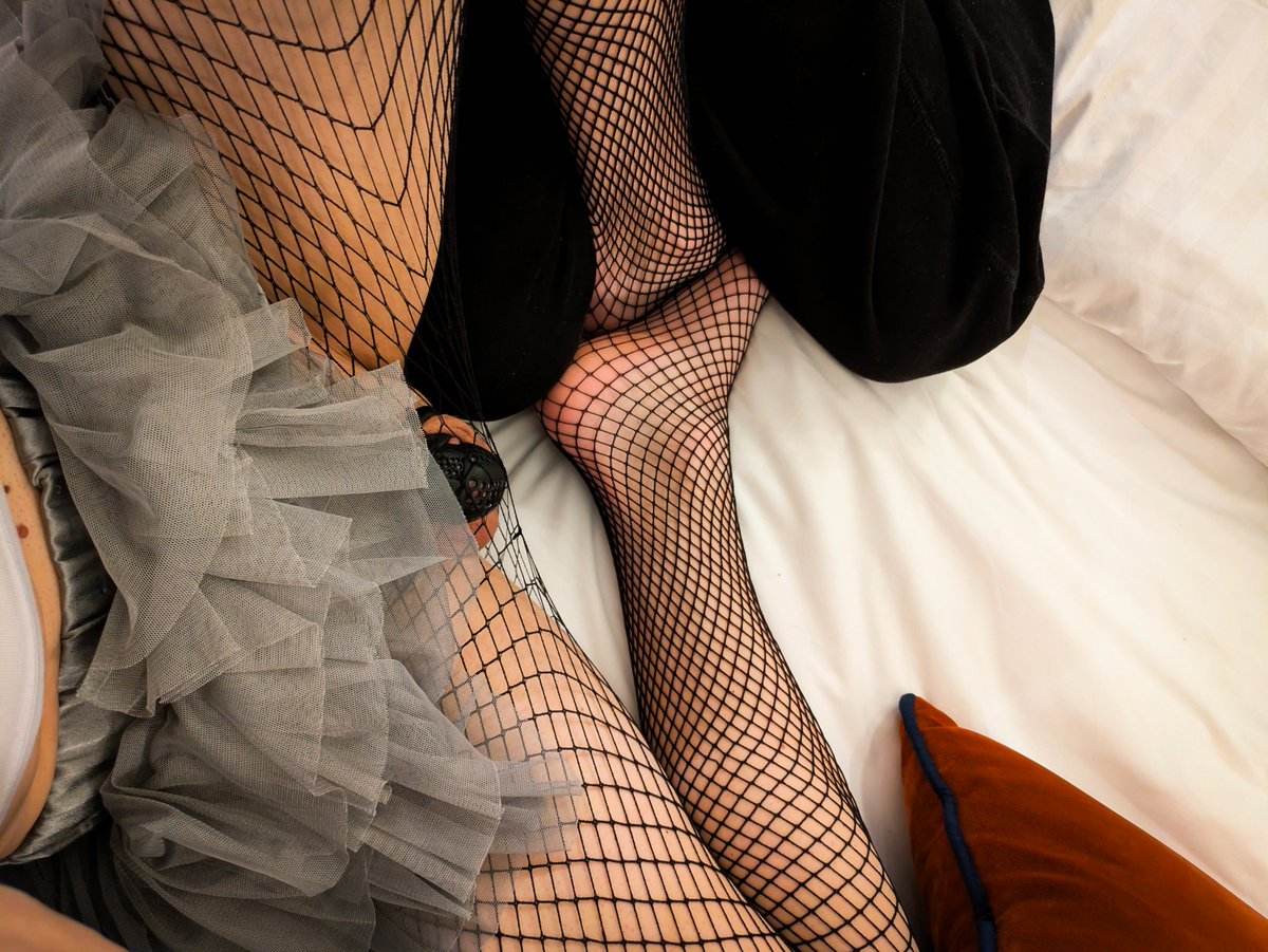 LockedZoe's tweet photo. Finally back in the hotel room and onto the bed... 🤫 Locked up tight and completely at your mercy. What would you do with a cute femboy waiting for you like this? ⛓️🔒🖤

#femboy #crossdresser #sissy #cutefemboy #fishnets #thighhighs #skirt #submissive #kinky #tease #chastity https://t.co/1R6d0UoIEI