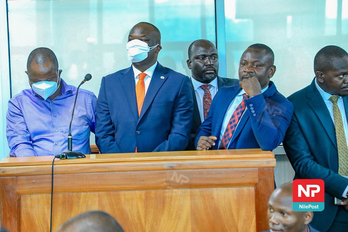 MrBusinge's tweet photo. Timothy Kalyegira, accused of allegedly broadcasting without a license, was in handcuffs as he appeared in court. 

On the other hand, Chris Obore and his six colleagues, accused of stealing over Shs27b, were not handcuffed at any point during their arrest or journey to court. https://t.co/fF2Q5Xg94m