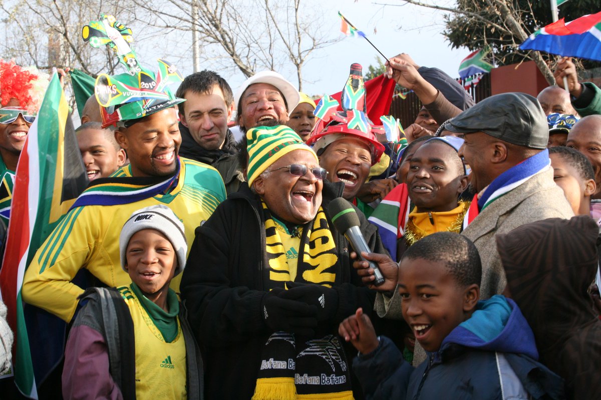 TheTutuLegacy's tweet photo. Yellow vuvuzela. Full Bafana kit. Writing Viva Bafana Viva on the wall.

This is the Arch, and he would have been awake for every single minute. 🇿🇦🖤

"It's unbelievable! I'm dreaming man, I'm dreaming! Wake me up! What a lovely dream!"

He said that in 2010. He meant it every time Bafana played.

This month they made history - knockout stages of a FIFA World Cup for the first time ever. They went down fighting, in the 92nd minute, in Los Angeles. Not their heart. Not their pride.

Welcome home, Bafana. You made the Arch proud.

"Never before have we experienced this overwhelming joy of unity in purpose." — Archbishop Desmond Tutu 🖤

📷 Image 2 of 95 | Photo credit: Benny Gool & contributors

#Bafana2026 #WorldCup2026 #DesmondTutu #TutuLegacy #95Images #BafanaBafana