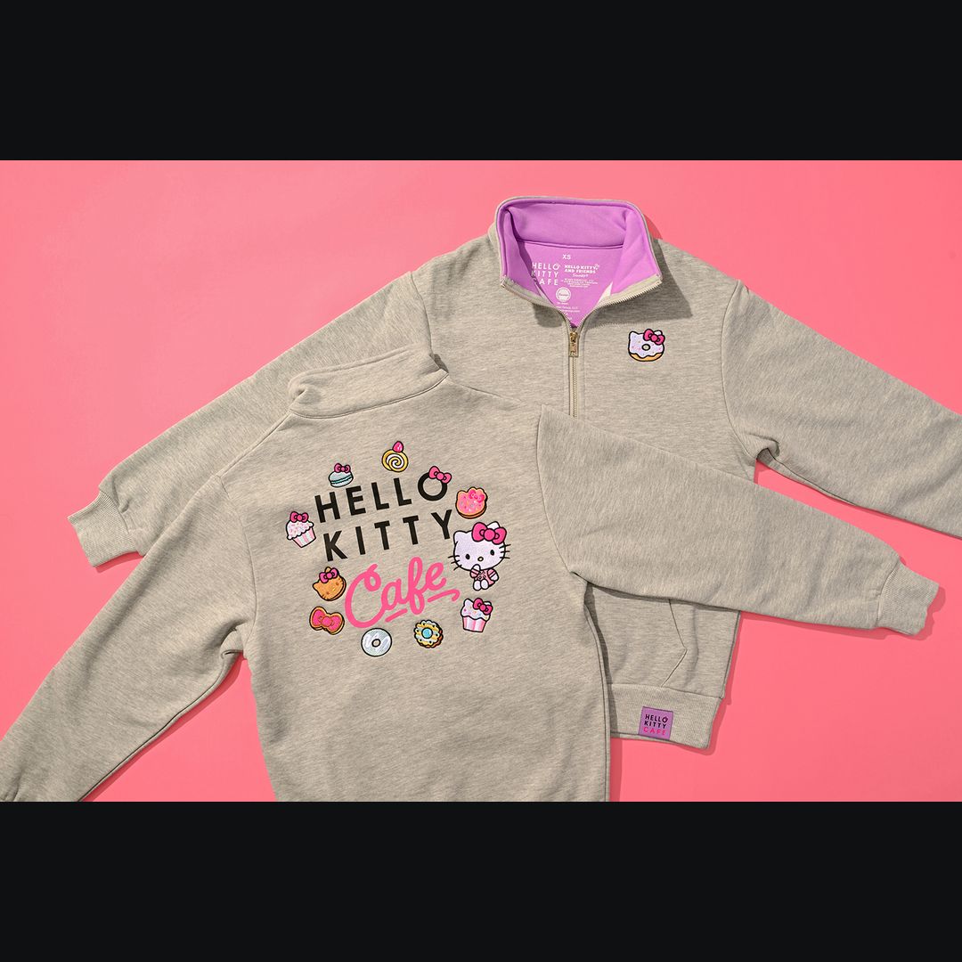 ConLootApp's tweet photo. SDCC 2026 exclusive: Hello Kitty Cafe Quarter Zip just dropped! Track this &amp; more on @conlootapp #HelloKitty #SDCC2026 https://t.co/VY2DqIlINq