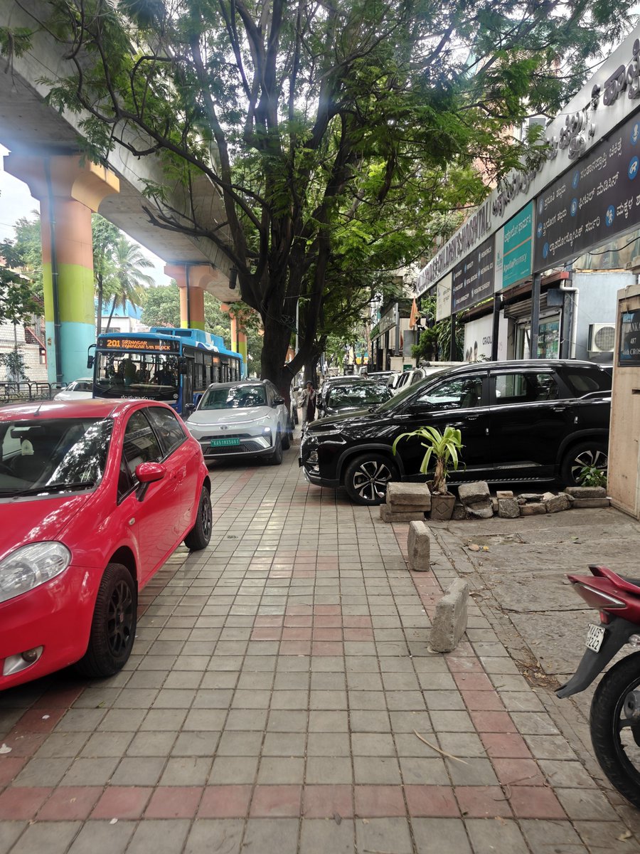 filtercoffeee's tweet photo. Is this obstruction of footpath as well or it just street vendors https://t.co/SAl0ja5dTC