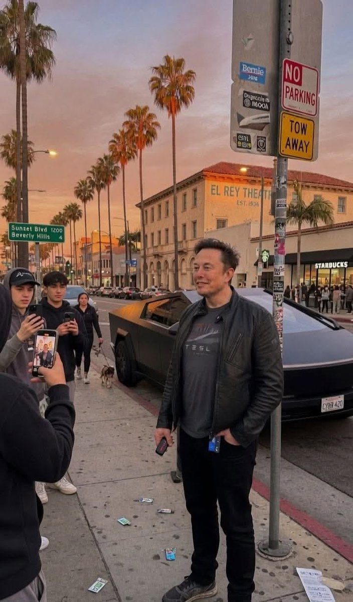 Elon debates tweet media