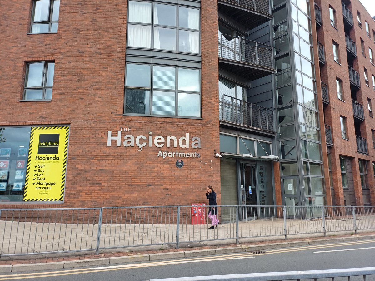 kendie's tweet photo. Takes me back to my clubbing days! Now apartments. Here for the night ... off to see Take That. They were probably still at school while I was clubbing here ! Bizarrely put TV on and Joy Division came on! #Hacienda #Manchester #JoyDivision #Fac51 https://t.co/QxOe6cPrYf