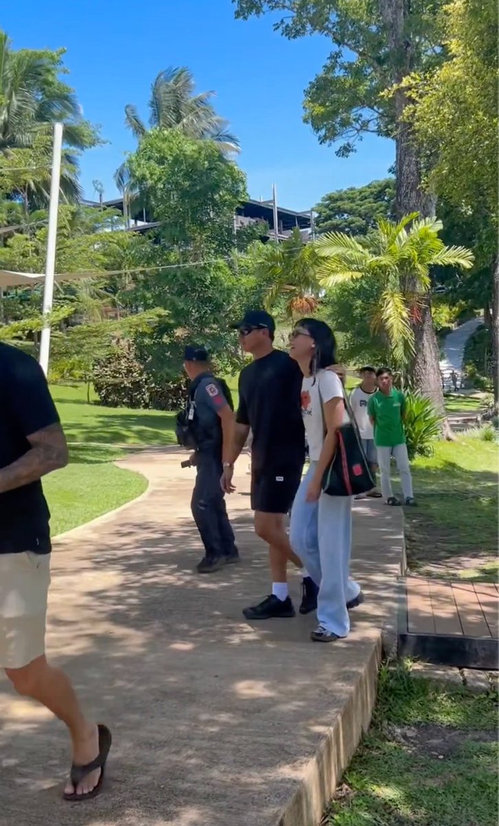 blairwaldorfs_'s tweet photo. as a tall couple thing ata talaga nila yung arms ni dj nasa shoulder ni kai and her hand is on his back 🥹 they love to walk like that huhu 

and kaila's smile 🥹🥹 https://t.co/EVoyfW6Goj