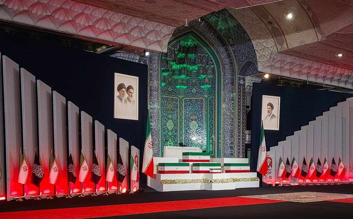 ichmumbai4's tweet photo. Frames of the pure bodies of the martyred Leader, Imam Sayyid Ali Khamenei, and his martyred family members, as foreign delegations and dignitaries pay their respects at the Tehran Mosalla, July 3, 2026 https://t.co/6rd7DQtDuN
