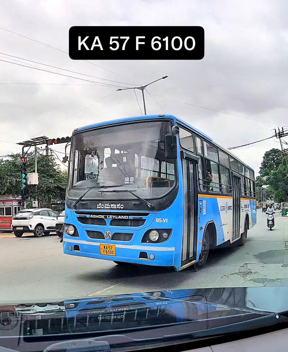 ritheshraok's tweet photo. @blrcitytraffic @BlrCityPolice @BMTC_BENGALURU Today at Belathur signal, BMTC driver rode dangerously by jumping signal, with no care towards law and public safety. You can see the signal turns green and this BMTC driver almost hit me. Please take action. https://t.co/oTu3wZKQmo