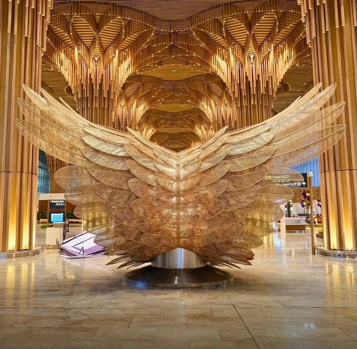 BJP4India's tweet photo. Bamboo art in the new terminal of Guwahati Airport. Its really mesmerising! https://t.co/F34UrFuAbm