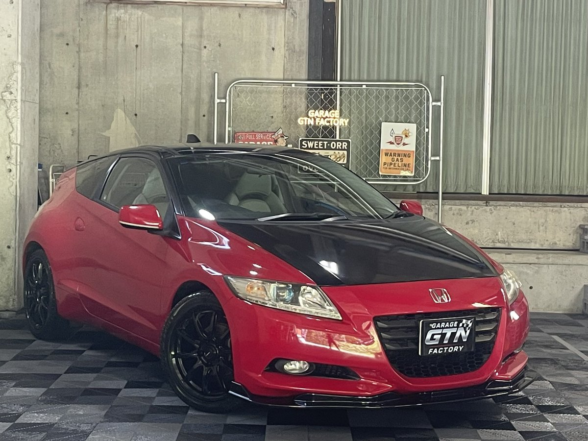 r31329102's tweet photo. 6速マニュアルのCRZが入荷しました♪
ナビ、バックカメラ
ETC付き
スカイルーフ付き
本革シート
17インチ社外アルミ
新品リップスポイラー
ボンネットルーフリアゲートラッピング
色々カスタムしてます！
そこの貴方🫵レアな車両いかがでしょうか？
赤い彗星になれますよ☄️

https://t.co/A7icAeZtkQ https://t.co/UUIrIqa0oq