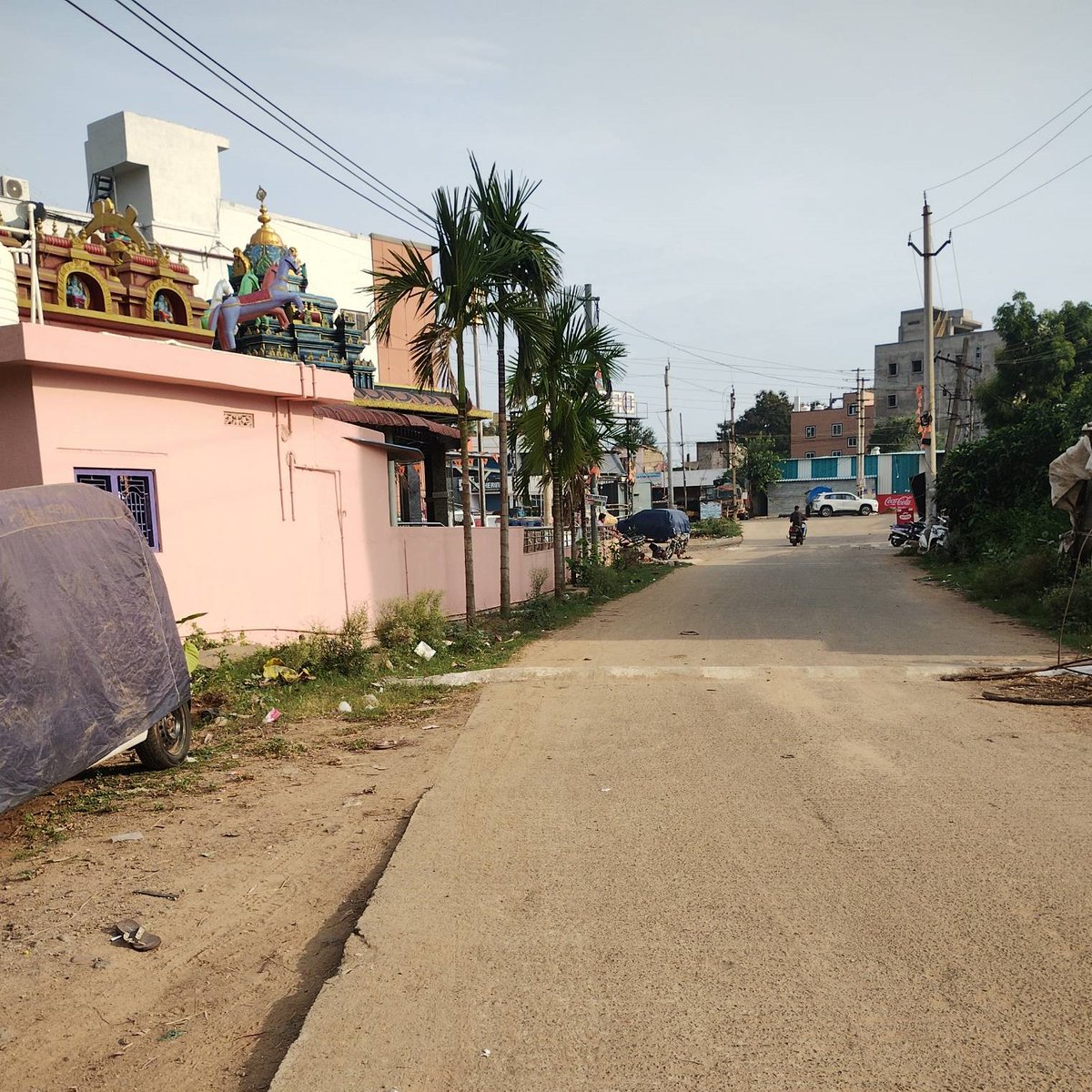 Avasarala_Akhil's tweet photo. Dear @GVMC_VISAKHA Two unauthorized,short &amp; tall unsceintific speed breakers have been laid beside DRC Mall road leading to Durga temple,Pendurthi.This is a low traffic residential zone &amp; not a school zone. They're causing severe vehicle damage &amp; high accident risks.Pls intervene https://t.co/MuEcRyvZf3