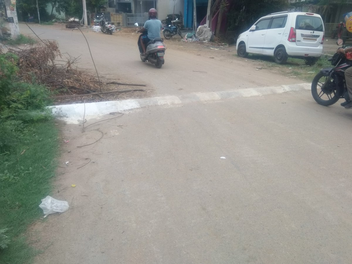 Avasarala_Akhil's tweet photo. Dear @GVMC_VISAKHA Two unauthorized,short &amp; tall unsceintific speed breakers have been laid beside DRC Mall road leading to Durga temple,Pendurthi.This is a low traffic residential zone &amp; not a school zone. They're causing severe vehicle damage &amp; high accident risks.Pls intervene https://t.co/MuEcRyvZf3