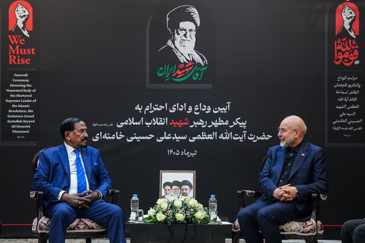 BDMOFA's tweet photo. Hon'ble Speaker of the Bangladesh National Parliament, Mr. Hafiz Uddin Ahmed, held a meeting with his Iranian counterpart, H.E. Mr. Mohammad Bagher Ghalibaf, Speaker of the Islamic Consultative Assembly of the Islamic Republic of Iran, in Tehran today.

Speaker Ghalibaf warmly welcomed the Hon'ble Speaker and the Bangladesh delegation to Iran on the occasion of the State Funeral of the late Supreme Leader of Iran, His Eminence Ayatollah Ali Khamenei.

Hon'ble Speaker Hafiz Uddin expressed his profound condolences on the tragic demise of His Eminence and condemned his brutal killing. He conveyed the solidarity of the Government and the people of Bangladesh with the Government and the brotherly people of Iran during this period of national mourning. 

The Hon'ble Speaker also highlighted the centuries-old friendship and deep cultural and people-to-people ties between Iran and Bangladesh.

He appreciated Speaker Ghalibaf's constructive role in facilitating the recent peace MoU between Iran and the United States, expressing the hope that the agreement would usher in lasting peace, stability, and prosperity for the Iranian people and the wider region. He reaffirmed Bangladesh's support for the ongoing peace process and hoped all parties will build on this momentum to achieve a durable resolution of outstanding issues through dialogue and diplomacy.

The Hon'ble Speaker extended an invitation to Speaker Ghalibaf to pay an official visit to Bangladesh at a mutually convenient time.

The Hon'ble Speaker arrived in Tehran yesterday to lead the Bangladesh delegation to the State Funeral. Upon his arrival, the delegation was warmly received at the airport by H.E. Mr. Hamid Reza Haji Babaei, Deputy Speaker of the Islamic Consultative Assembly of Iran.