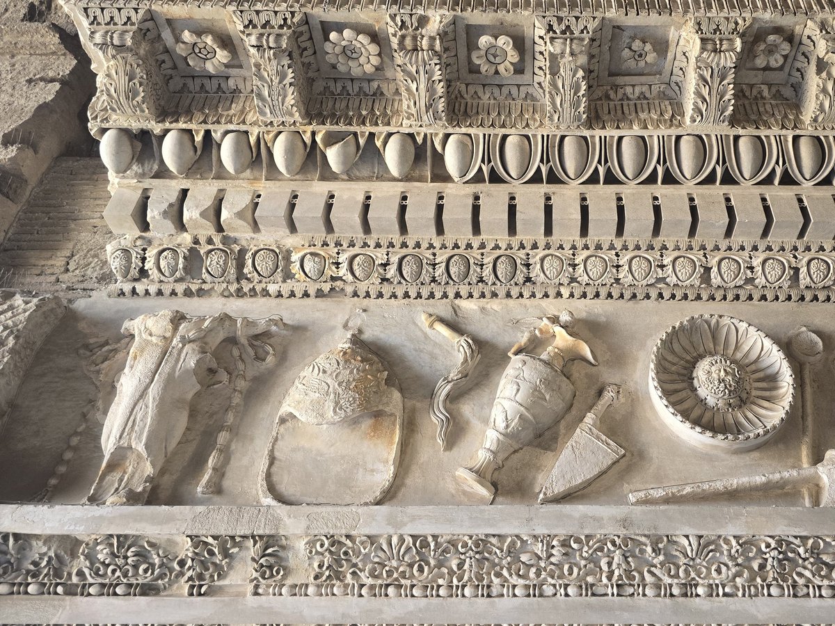TimeTravelRome's tweet photo. ๐ช Bucrania frieze from the Temple of Vespasian and Titus, Roman Forum. 1st century AD. What looks decorative is a frozen sacrifice โ ox skulls hung on temple walls after ritual killing, garlands strung between them. Made permanent in stone. #AncientRome #RomanHistory #RomanForum https://t.co/K2ndAGpPKi