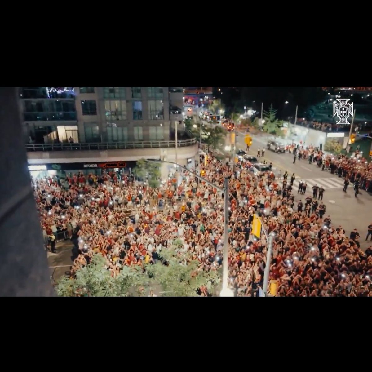 Nsukka_okpa's tweet photo. João Neves had the absolute nerve to say Cristiano Ronaldo is "just another player here to help."

Some people literally drove 10 hours straight just to get to Toronto, and the massive traffic gridlock started miles out before anyone even neared the city center. Thousands of fans stood outside the Delta Hotel baking in a brutal heat wave for over 2 hours just to see one man. 

And you know what the craziest part is? Even after Ronaldo finally came out onto the balcony, stood there, and went back inside, absolutely no one left. The crowd just stayed there chanting.

Do you honestly think people are causing a city-wide transit shutdown, risking heat stroke, and chasing buses because they give a single care about the rest of the squad? 😭 No! They are there for the biggest icon on the planet. Ronaldo didn't just put Portugal on the map—he’s the sole reason half of you have any global clout.