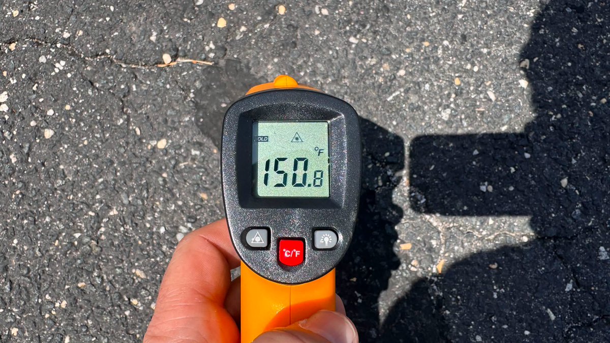 TonyPannWBAL's tweet photo. Yesterday, WBAL photographer Mike French measured the pavement temperature in the peak heat of the afternoon. 👇 150 degrees! 😳 Keep that in mind for your puppy when outside today. Temps close to 100 again this afternoon. https://t.co/Yp66P2QMpl