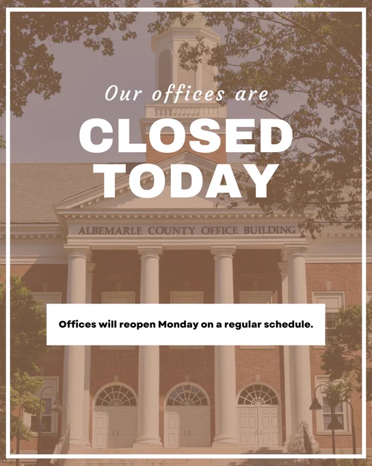 Albemarle County Office Building with a notice that offices are closed today and will reopen Monday on a regular schedule.