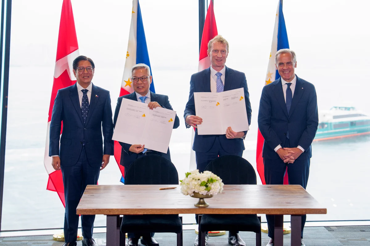 PM Carney with Minister Miller and representatives from the Philippines signing a Memorandum of Understanding on Cultural Cooperation.