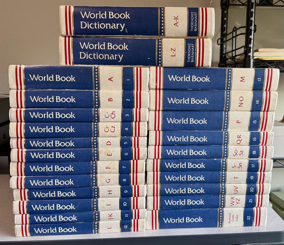 TinyStupidDemon's tweet photo. GM Patriots!  We interrupt our usual music poasting to show off this relatively unused set of 1976 Bicentennial Edition World Book Encyclopedias and Dictionaries.  IIRC we had used a prior set then my mother sold them for a while and got this set as a prize. https://t.co/UHFKuhljUT