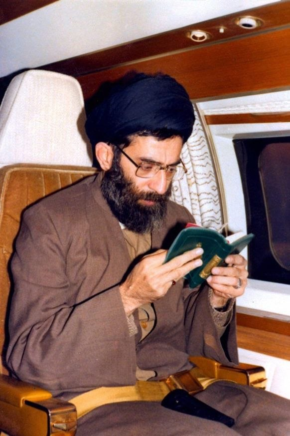 Khamenei_m's tweet photo. Countdown to the final farewell with the man who:

Would read the Quran even on the plane. He'd say: "We must strengthen our bond with the Quran day by day. Read it in your homes. Even when you have a moment of rest, connect yourself to the Quran. Read a portion every day." https://t.co/8iNfJxXjIG