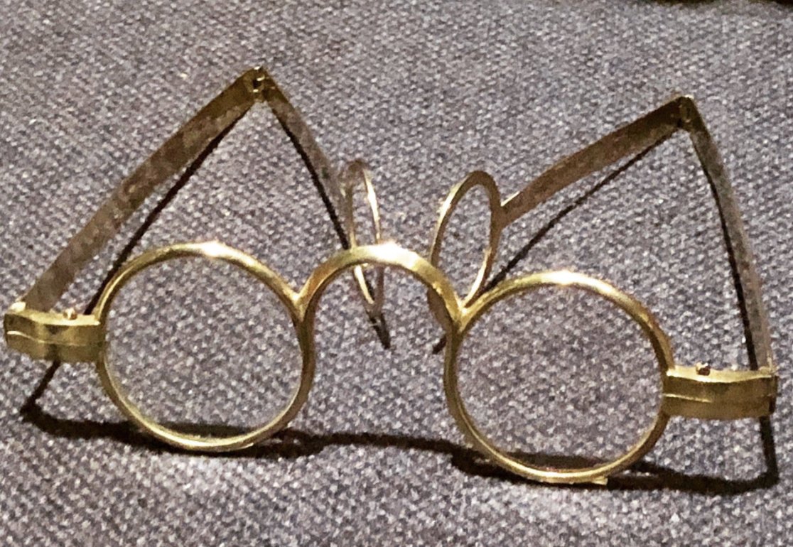 US_OGA's tweet photo. George Washington's Spectacles:  

At the end of the Revolutionary War, Congress was broke and owed back pay to many officers and soldiers in the army. 

Rumors began to spread that to solve the problem, Congress would just disband the army and send them home without pay.

Some officers, influenced by anonymous letters known as the Newburgh Addresses began discussing radical action such as marching on Congress. 

This raised fears of a military coup that could have destroyed the nation in its infancy.

On March 15 1783, new Newburgh New York, General Washington called his officers together at the Temple of Virtue - a large wooden hall built by the soldiers as a chapel and dance hall.

He arrived unexpectedly just after General Horatio Gates had opened the meeting.

Washington spoke to his men and he sympathized with the officers’ hardships including his own but firmly condemned any move against the civilian government.

He appealed to their patriotism, honor, and sense of duty.  He warned against plunging the country into “civil horror.”

As Washington prepared to read a letter from Congress explaining the situation, he struggled to read the print. 

Then he reached into his pocket and pulled out a pair of reading spectacles—the first time most of the officers had ever seen him wear glasses.  He had only recently started needing them and had kept it private.

He paused and said:

“Gentlemen, you will permit me to put on my spectacles, for I have not only grown gray but almost blind in the service of my country.”

The officers were stunned. 

Here was their revered, seemingly invincible commander—now openly acknowledging his age, weariness, and physical frailty after years of shared sacrifice. 

Many of them were moved to tears. The tension in the room dissolved. The conspiracy collapsed. 

The officers voted to express their “unshaken confidence” in Congress and rejected any irregular or mutinous actions. 

Washington later successfully lobbied Congress on their behalf, and the army received a settlement of five years of full pay.

The moment is widely regarded as one of Washington’s greatest acts of leadership.

Our country was founded and preserved by the greatest of men.